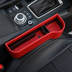 Red car organizer in a vehicle's console area