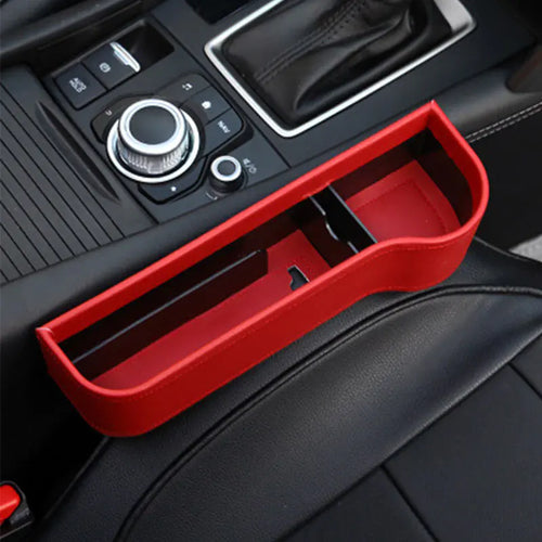 Red car organizer in a vehicle's console area
