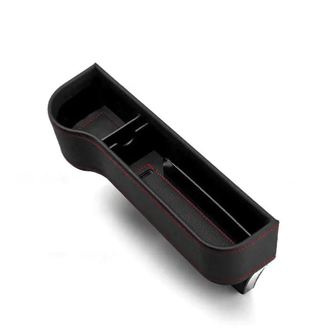 Black car cup holder organizer with red stitching on a white background