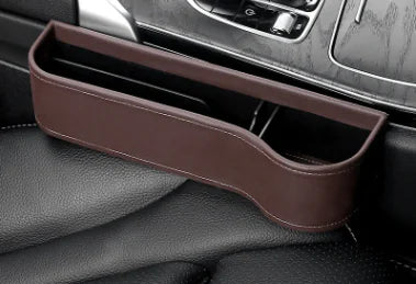 Brown car cup holder extender on a car dashboard